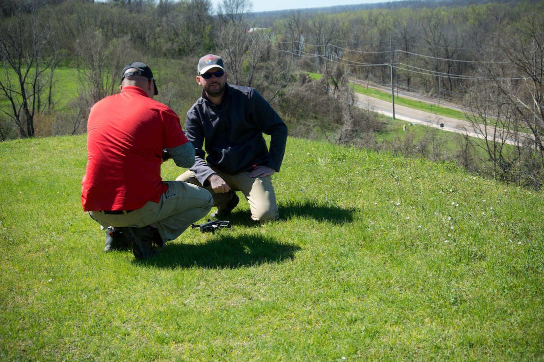 Daniel Hickman and David Nguyen, members of the U.S. Army Engineer Research and Development Center’s Coastal and Hydraulics Laboratory’s Unmanned Aircraft Systems Team, prepare a UAS for flight over a landslide at the Vicksburg National Military Park.