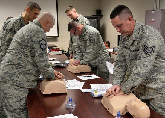 Airmen from both the 445th Maintenance and Aircraft Maintenance Squadrons participate in CPR training during the Feb. 8, 2020 unit training assembly. During the training, Airmen refreshed and demonstrated their understanding of emergency medical response procedures by providing mouth-to-mouth resuscitation, performing chest compressions and utilizing an automated external defibrillator. (U.S. Air Force photo/Staff Sgt. Ethan G. Spickler)