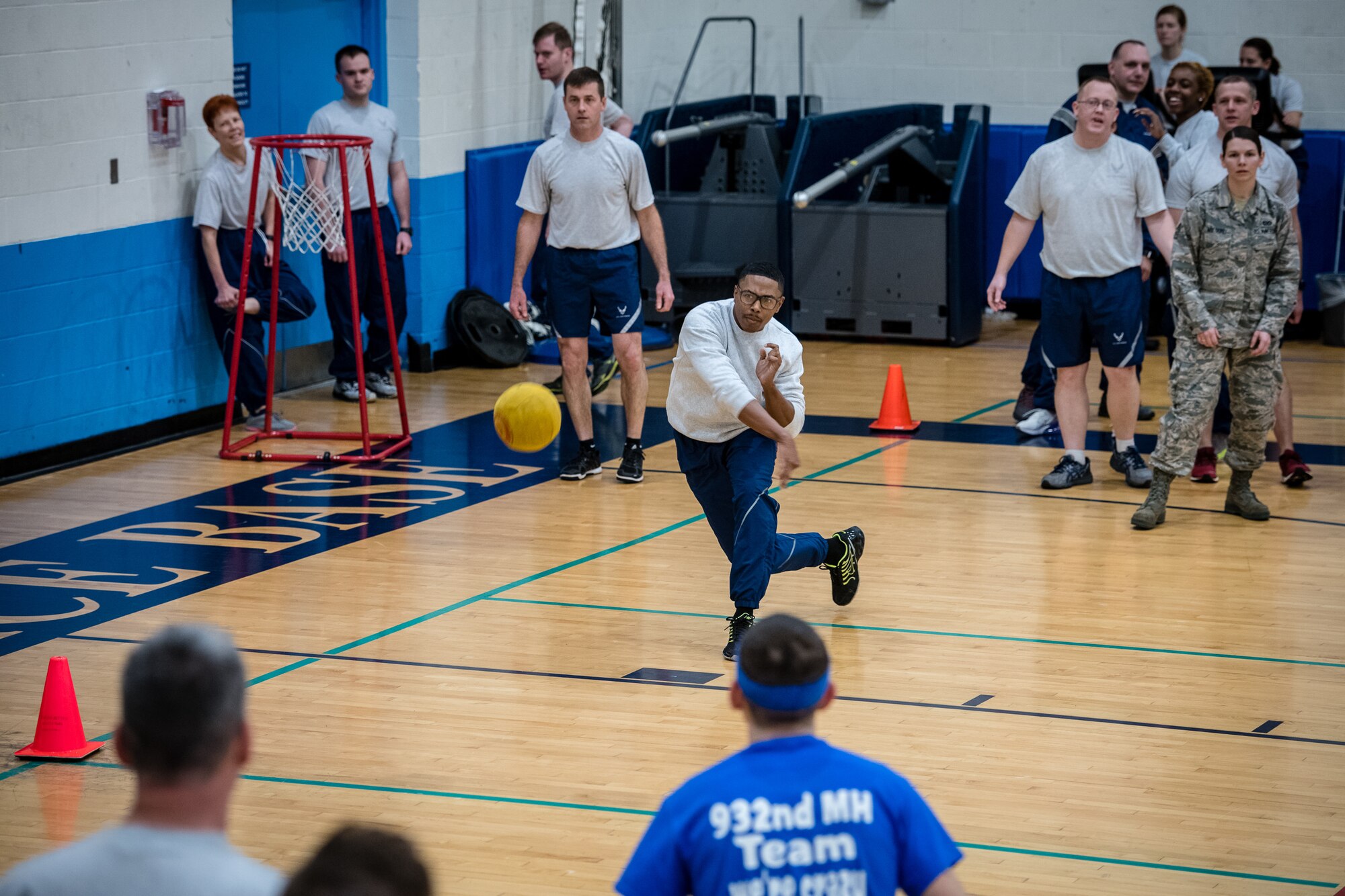 Citizen Airmen with the 932nd Medical Group join in some team building dodgeball during a resiliency pause February 9, 2020 Scott Air Force Base, Illinois. The intent of the planned pause is to give leadership and Airmen a chance to bond and create some camaraderie. (U.S. Air Force photo by Master Sgt. Christopher Parr)