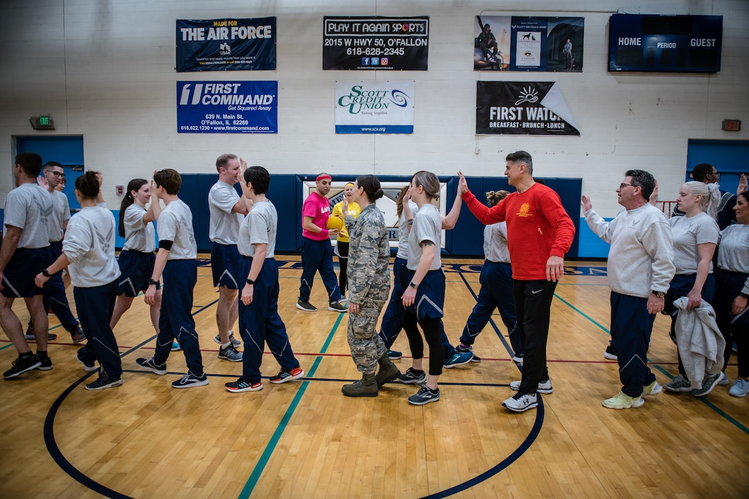 Citizen Airmen with the 932nd Medical Group join in some team building dodgeball during a resiliency pause February 9, 2020 Scott Air Force Base, Illinois. The intent of the planned pause is to give leadership and Airmen a chance to bond and create some camaraderie. (U.S. Air Force photo by Master Sgt. Christopher Parr)