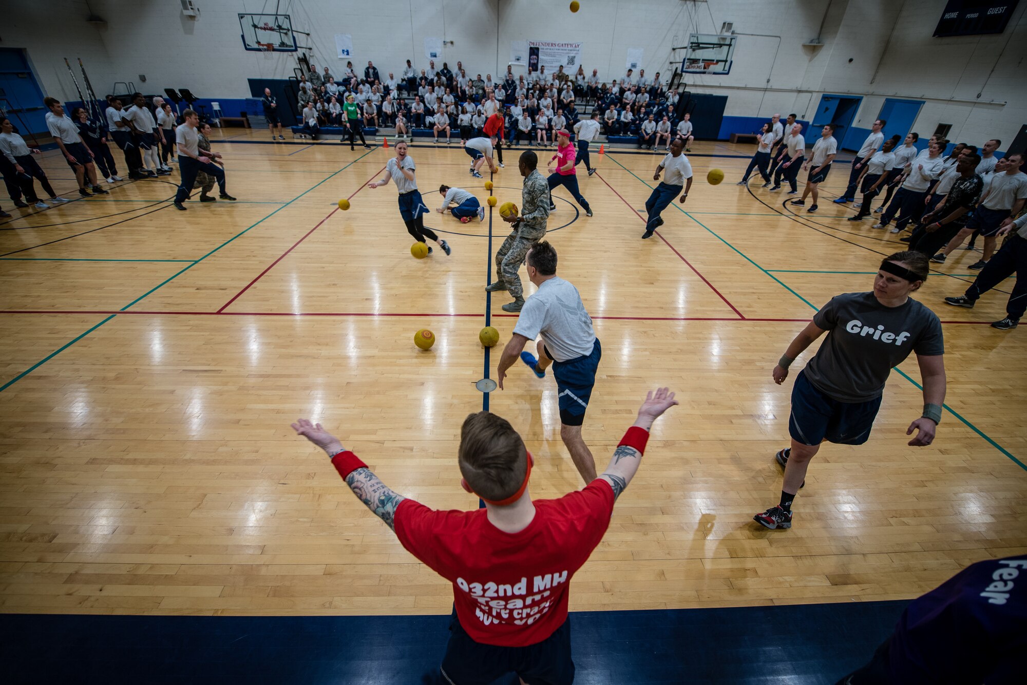 Citizen Airmen with the 932nd Medical Group join in some team building dodgeball during a resiliency pause February 9, 2020 Scott Air Force Base, Illinois. The intent of the planned pause is to give leadership and Airmen a chance to bond and create some camaraderie. (U.S. Air Force photo by Master Sgt. Christopher Parr)