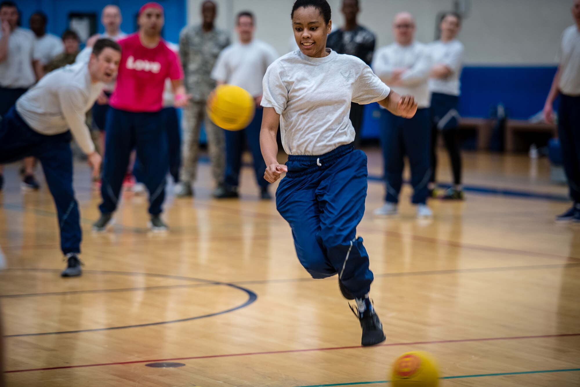 Citizen Airmen with the 932nd Medical Group join in some team building dodgeball during a resiliency pause February 9, 2020 Scott Air Force Base, Illinois. The intent of the planned pause is to give leadership and Airmen a chance to bond and create some camaraderie. (U.S. Air Force photo by Master Sgt. Christopher Parr)