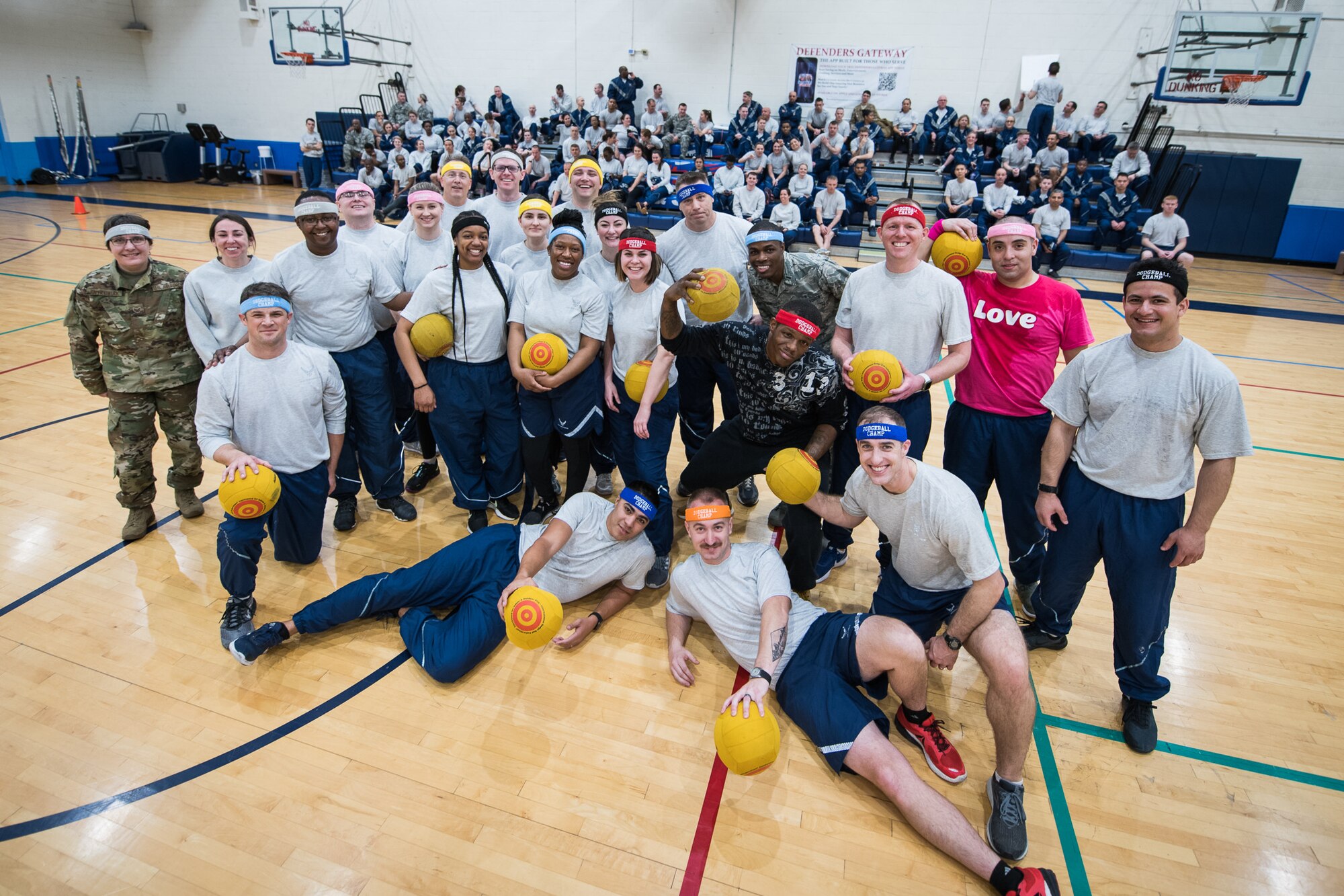 Citizen Airmen with the 932nd Medical Group join in some team building dodgeball during a resiliency pause February 9, 2020 Scott Air Force Base, Illinois. The intent of the planned pause is to give leadership and Airmen a chance to bond and create some camaraderie. (U.S. Air Force photo by Master Sgt. Christopher Parr)