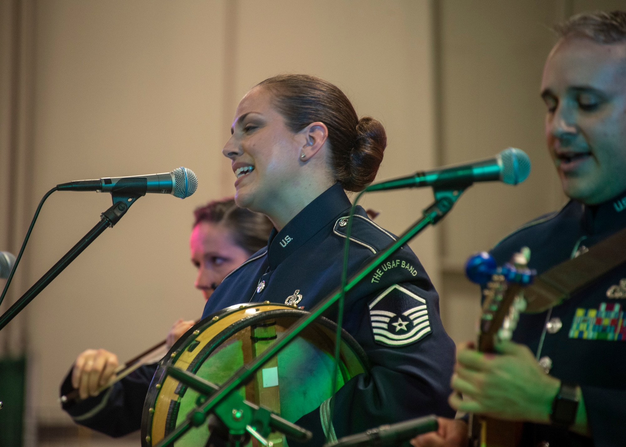 Master Sgt. Julia Cuevas, U.S. Air Force Band ensemble Celtic Aire traditional Irish instrumentalist and vocalist, sings during the 38th Annual North Texas Irish Festival in Dallas, Tx., March 7, 2020. Celtic Aire Performed at the 33rd Annual North Texas Irish Festival back in 2016 and has been asked back each year since. This was the first year they were able to perform for the festival again. (U.S. Air Force photo by Staff Sgt. Jared Duhon)