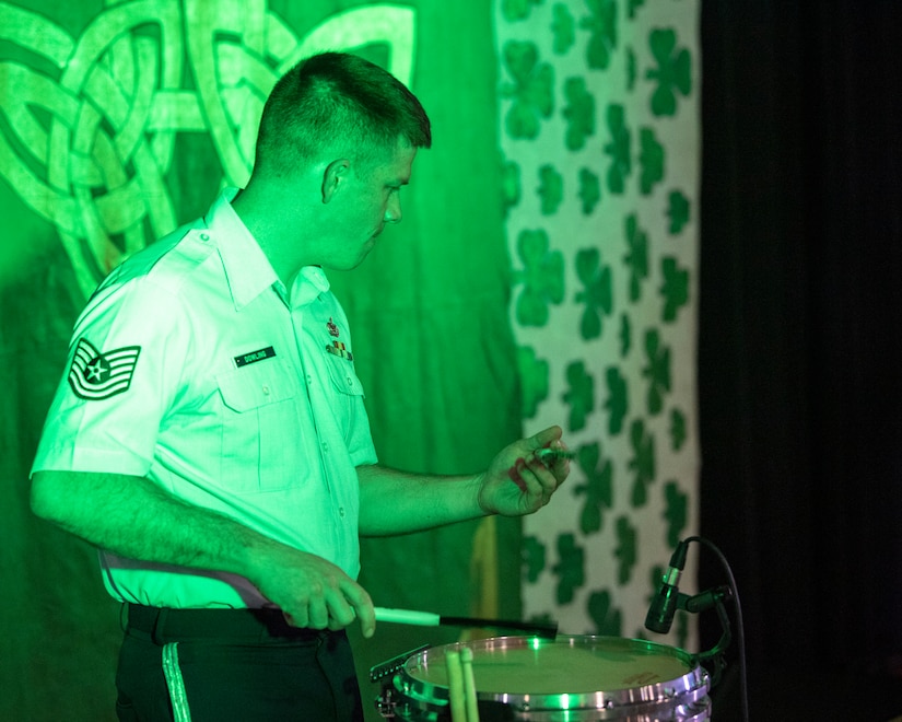 Tech. Sgt. Daniel Dowling, U.S. Air Force Band ensemble Celtic Aire percussionist, performs at the 38th Annual North Texas Irish Festival in Dallas, Tx., March 8, 2020. The North Texas Irish Festival was March 6-8, and provided an opportunity for Celtic Aire to perform music that reflects the culture of the Irish and put a classic spin on modern pop songs. (U.S. Air Force photo by Staff Sgt. Jared Duhon)