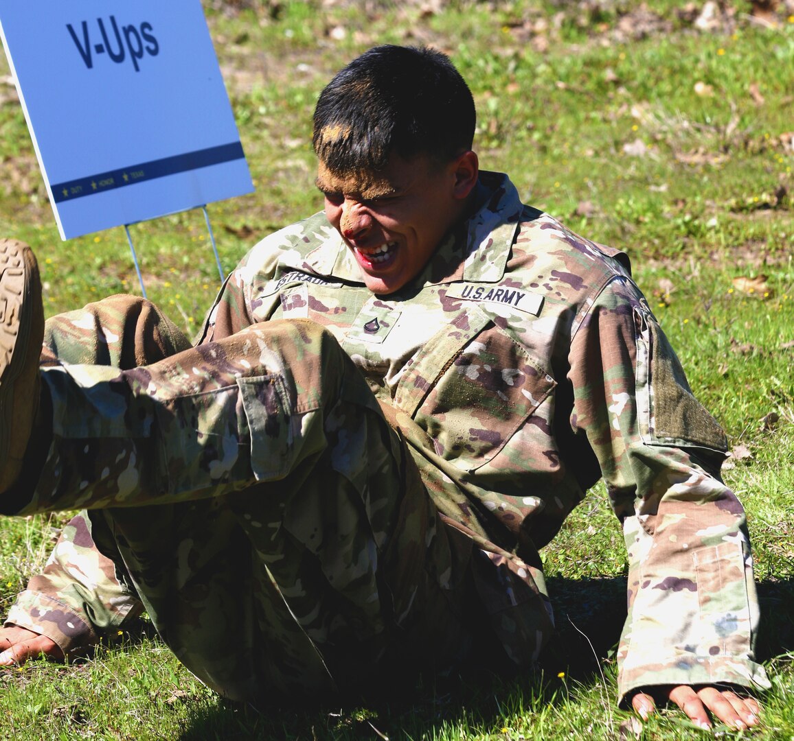 Army Pfc. Maximilliano Estrada of the 71st Expeditionary Military Intelligence Brigade performs V-ups during the obstacle course portion of the Texas Military Department’s 2020 Best Warrior Competition March 5, 2020, at Camp Swift near Bastrop, Texas. Estrada, who began bleeding halfway through the event, refused to stop and completed the course.
