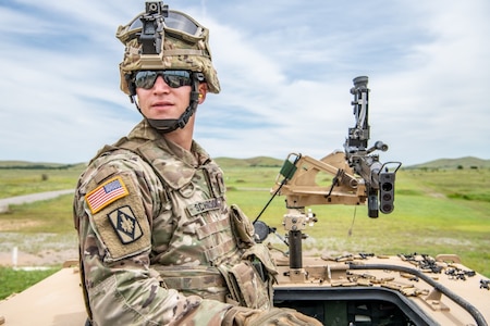 Pvt. Adrian Sanchez, Casa Grande, Ariz. native, multiple launch rocket system crewmember, hands equipment from his assigned M270 MLRS, Camp Casey, Republic of Korea, April 24. Sanchez and fellow Soldiers with Battery A., 6-37 FAR performed PMCS in order to maintain the readiness of their equipment, which is expected of all Soldiers. (U.S. Army photo by Capt. Daniel Parker)