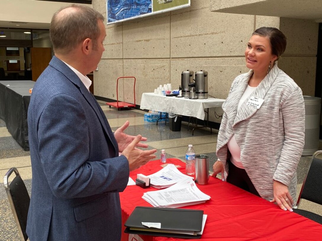 Dani Harrison, U.S. Army Corps of Engineers Nashville District contracting specialist, provides contracting information to Brad Moffett, during the 10th Annual Small Business Industry Day March 5, 2020 at Tennessee State University’s Avon Williams Campus in Nashville, Tenn.
