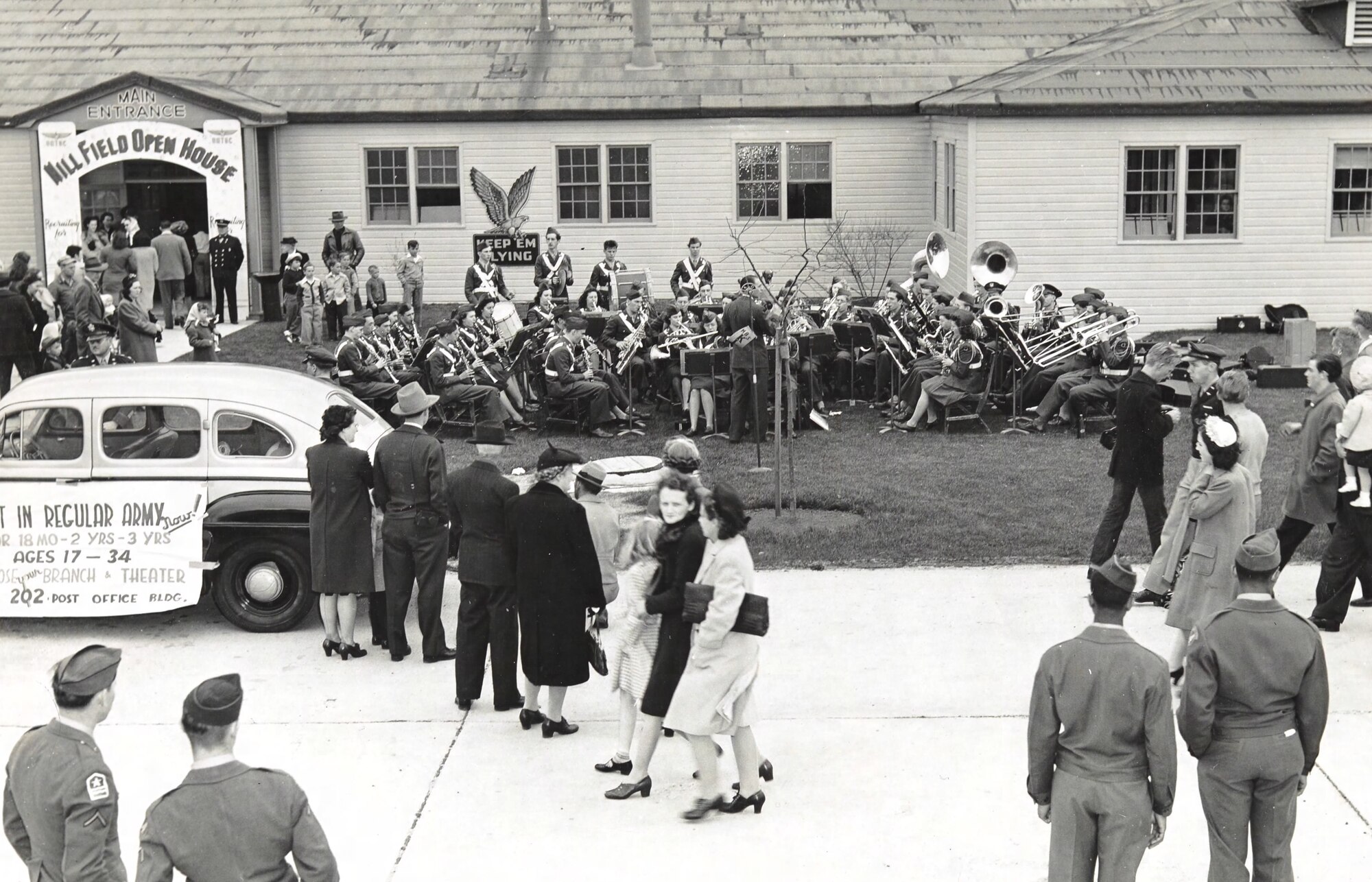 Spectators admire a band playing on a lawn during an open house at Hill Air Force Base.