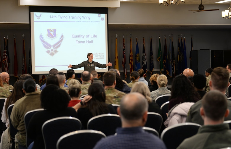 Col. Samantha Weeks, 14th Flying Training Wing commander, welcomes everyone to the Quality of Life Town Hall March 5, 2020, at the Columbus Club on Columbus Air Force Base, Miss. Weeks was the primary speaker for the town hall, which was also livestreamed on the Columbus AFB Facebook page for added participation and connection. (U.S. Air Force photo by Airman 1st Class Hannah Bean)