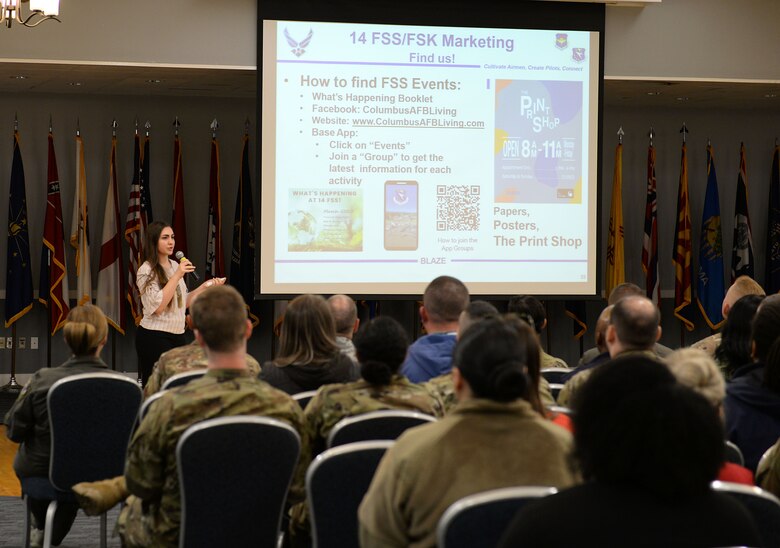 Rachel Buoni, 14th Force Support Squadron Visual Information specialist, briefs about where to find FSS events during the Quality of Life Town Hall March 5, 2020, at the Columbus Club on Columbus Air Force Base, Miss. Buoni showcased the various resources FSS Marketing utilizes to push out their information through and distribute. (U.S. Air Force photo by Airman Hannah 1st Class Bean)