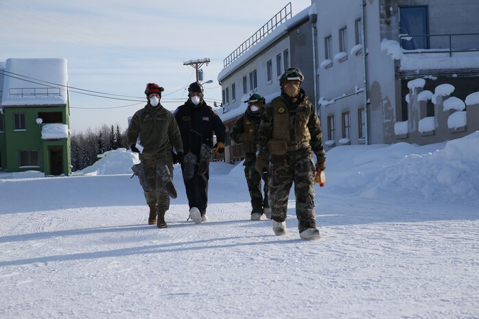 United States Marines and Sailors with Chemical Biological Incident Response Force (CBIRF) participate in cold weather training during Operation Arctic Eagle aboard Fort Wainewright, Ak. on Feb. 23, 2020. CBIRF conducted this training to practice responding in the extreme cold. (Official U.S. Marine Corps photo by Lance Cpl. Blakely Graham/Released)