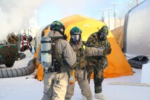 United States Marines and Sailors with Chemical Biological Incident Response Force (CBIRF) participate in cold weather training during Operation Arctic Eagle aboard Fort Wainewright, Ak. on Feb. 24, 2020. CBIRF conducted this training to practice responding in the extreme cold. (Official U.S. Marine Corps photo by Lance Cpl. Blakely Graham/Released)