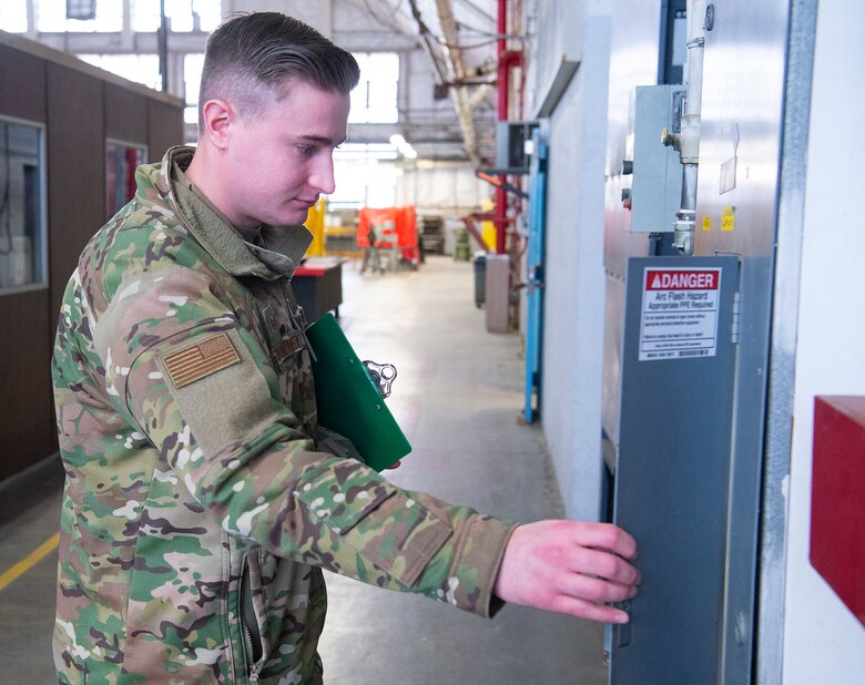 Staff Sgt. Hayden Ullery-Oatney, 88th Air Base Wing Safety Office occupation safety specialist, conducts a spot safety inspection Mar. 10, 2020, in the National Museum of the United States Air Force’s restoration hanger on Wright-Patterson Air Force Base, Ohio. (U.S. Air Force photo by R.J. Oriez)