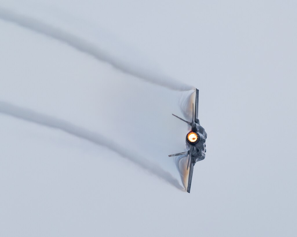 An F-35A Lightning II banking during a demonstration practice.