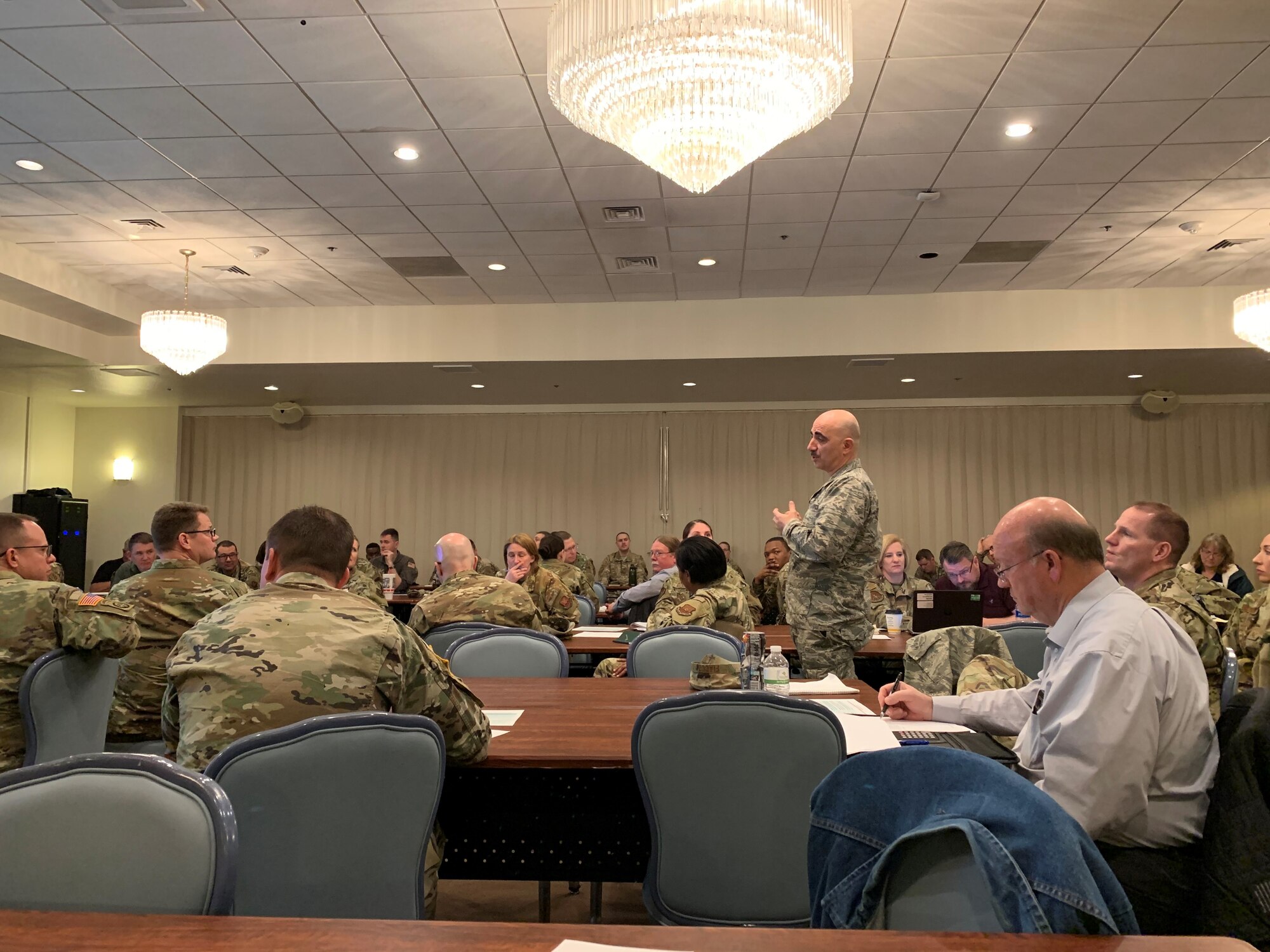Participants work through scenario of the tabletop exercise, March 5 at the Trail's End Club on F.E. Warren Air Force Base, Wyo. Over 60 people came together from the base and community to dicuss possible medical scenarios. (U.S. Air Force photo by Capt. James Fisher)