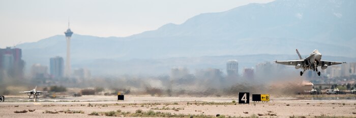 Aircraft flies in the air.