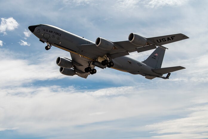 Aircraft flies in the air.