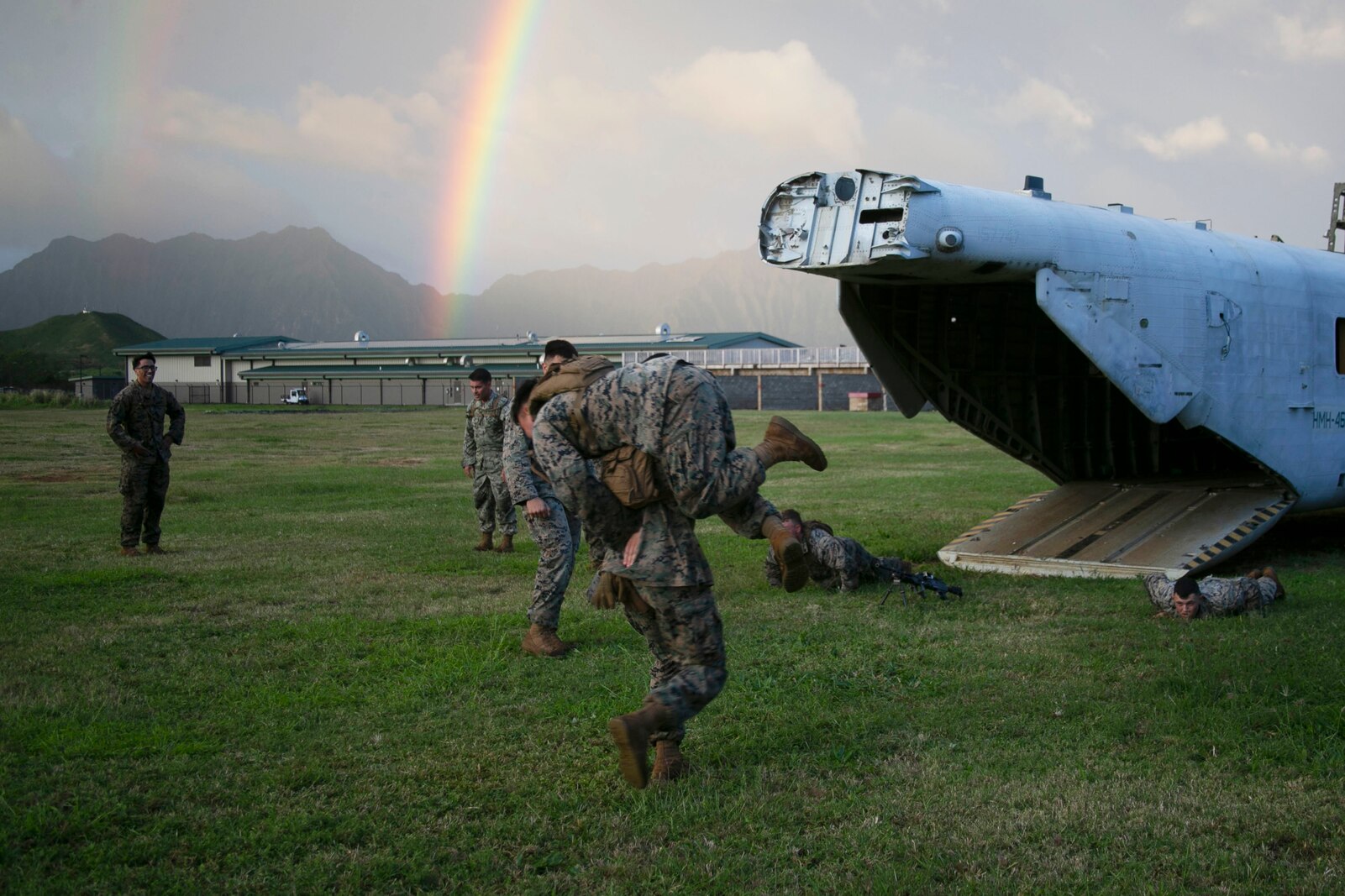 U.S. Marines with India Company, 3rd Battalion, 3rd Marine Regiment, conduct fireman carries during a company-level physical training event honoring Lance Cpl. William R. Prom on Marine Corps Base Hawaii, Feb. 10, 2020. Lance Cpl. Prom was with the unit when his actions in Vietnam during Operation Taylor Common were awarded with the Medal of Honor. (U.S. Marine Corps photo by Lance Cpl. Jacob Wilson)