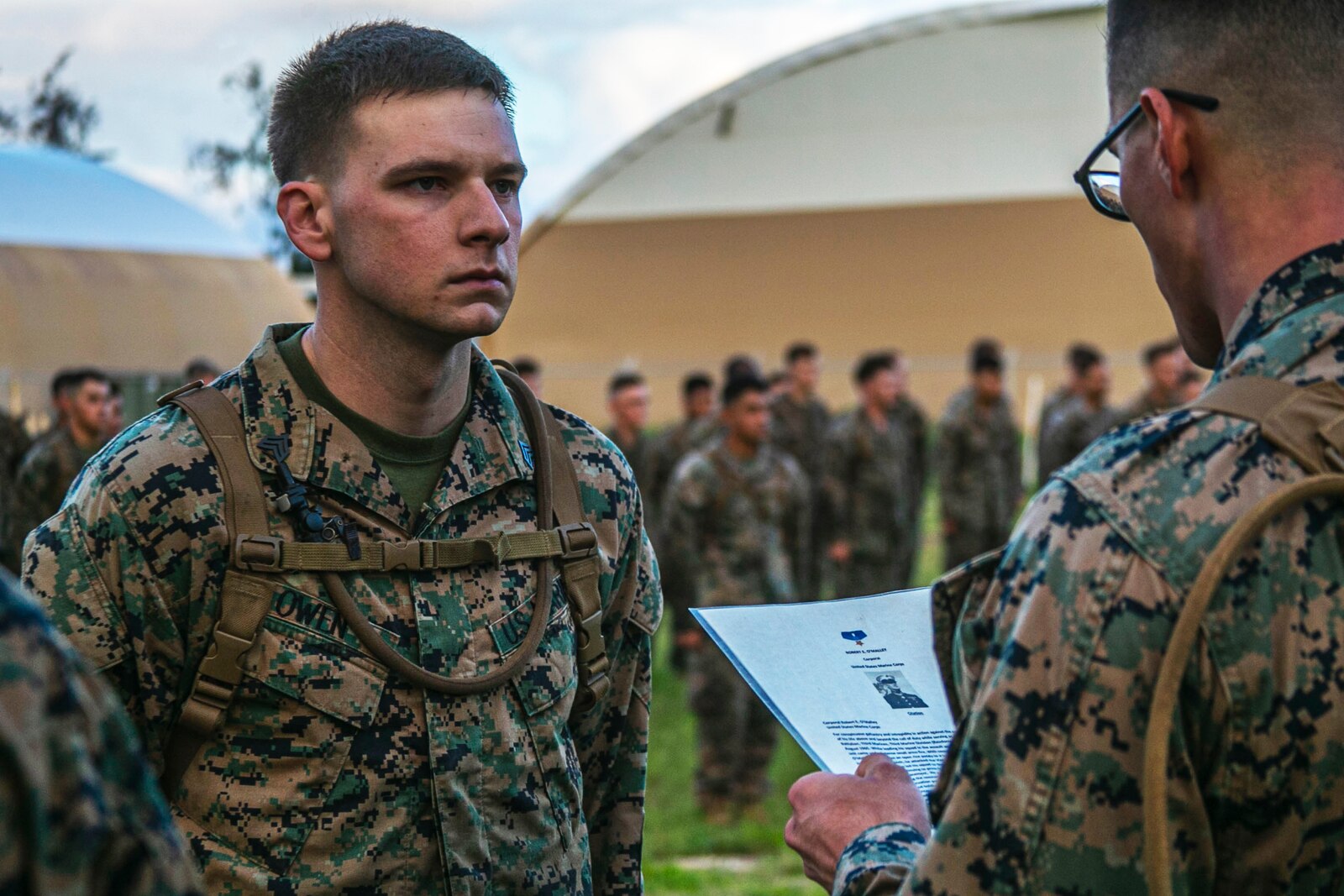 U.S. Marine Corps Sgt. Anthony Owen, squad leader, India Company, 3rd Battalion, 3rd Marine Regiment, is awarded the citation of Cpl. Robert E. O’Malley for outstanding service on Marine Corps Base Hawaii, Feb. 10, 2020. Cpl. O’Malley was with the unit when his actions in Vietnam during Operation Starlite were awarded with the Medal of Honor. (U.S. Marine Corps photo by Lance Cpl. Jacob Wilson)