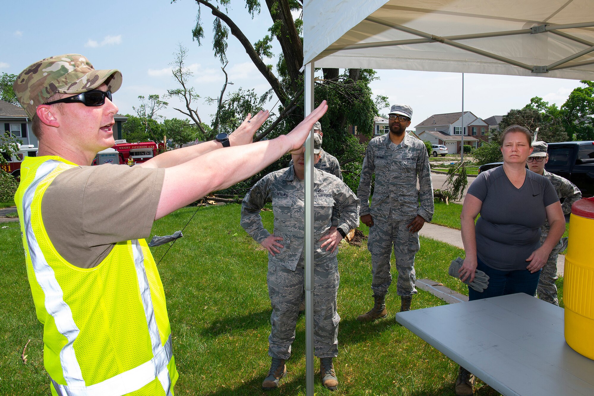 Senior Master Sgt. Christopher Blasengame, 88th Air Base Wing safety supervisor, briefs volunteers, May 28, 2019, before they go out to help clean up after a tornado came through damaging approximately 150 homes, at Wright-Patterson Air Force Base, Ohio. Volunteers and base emergency personnel worked to ensure everyone’s safety and begin the cleanup process. (U.S. Air Force photo by R.J. Oriez)