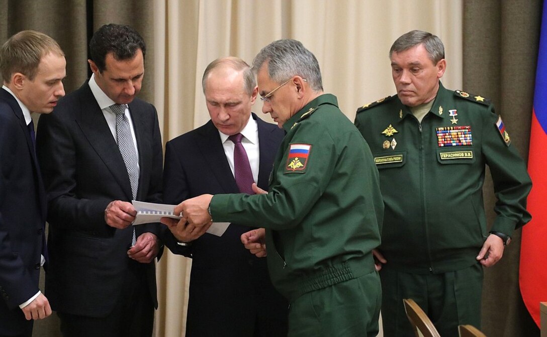 Syrian president Bashar al-Assad (second  from  left), Russian president Vladimir Putin (center), Russian minister of defense Sergei Shoigu (second from right), and chief of the general staff of the Russian Federation armed forces Valery Gerasimov (right) meet 21 November 2017 in Sochi, Russia, to discuss Russian support for operations in Syria.
