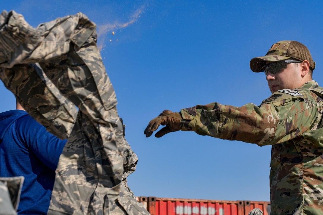 Airmen seperating uniform items