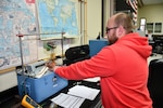 Chris Gorton, Instrument Mechanic for the Mid-Atlantic Regional Calibration Center, performing a temperature switch calibration for USS Kearsage (LHD 3) in direct support of fleet readiness.