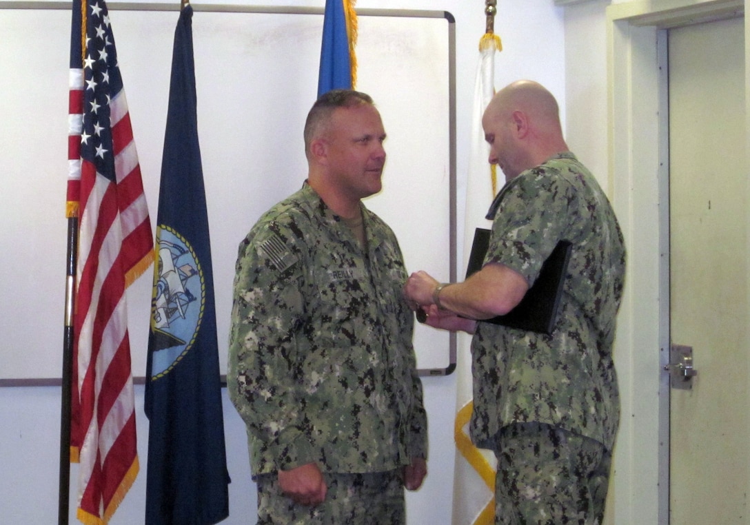 Rear admiral presents award