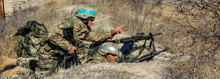 Georgian Soldiers locate opposing forces during a training exercise for the Georgian Defense Readiness Program- Training (GDRP-T) mission on Vaziani Training Area, March 3, 2020. Soldiers from 1st Battalion, 5th Cavalry Regiment, 2nd Brigade Combat Team, 1st Cavalry Division are currently supporting the GDRP-T mission, which is to mentor and advise the Georgian Armed Forces to help them improve their combat readiness and to augment Georgia’s ongoing defense reform efforts.