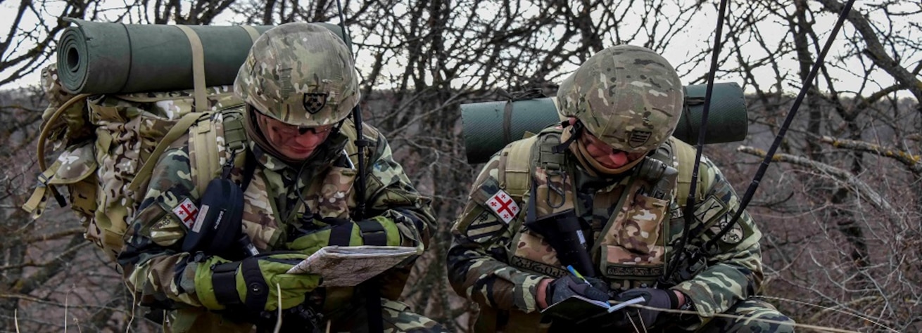 Georgian Soldiers conduct land navigation exercises during the Georgia Defense Readiness Program- Training (GDRP-T) on Vaziani Training Area, March 2, 2020. Soldiers from 1st Battalion, 5th Cavalry Regiment, 2nd Brigade Combat Team, 1st Cavalry Division are currently supporting the GDRP-T mission, which is to mentor and advise the Georgian Armed Forces to help them improve their combat readiness and to augment Georgia’s ongoing defense reform efforts. (U.S. Army photo by Spc. Zachary Stahlberg) 
