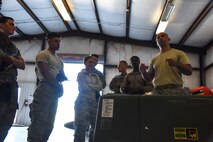 A photo of Airmen attending a safety briefing before a competition.