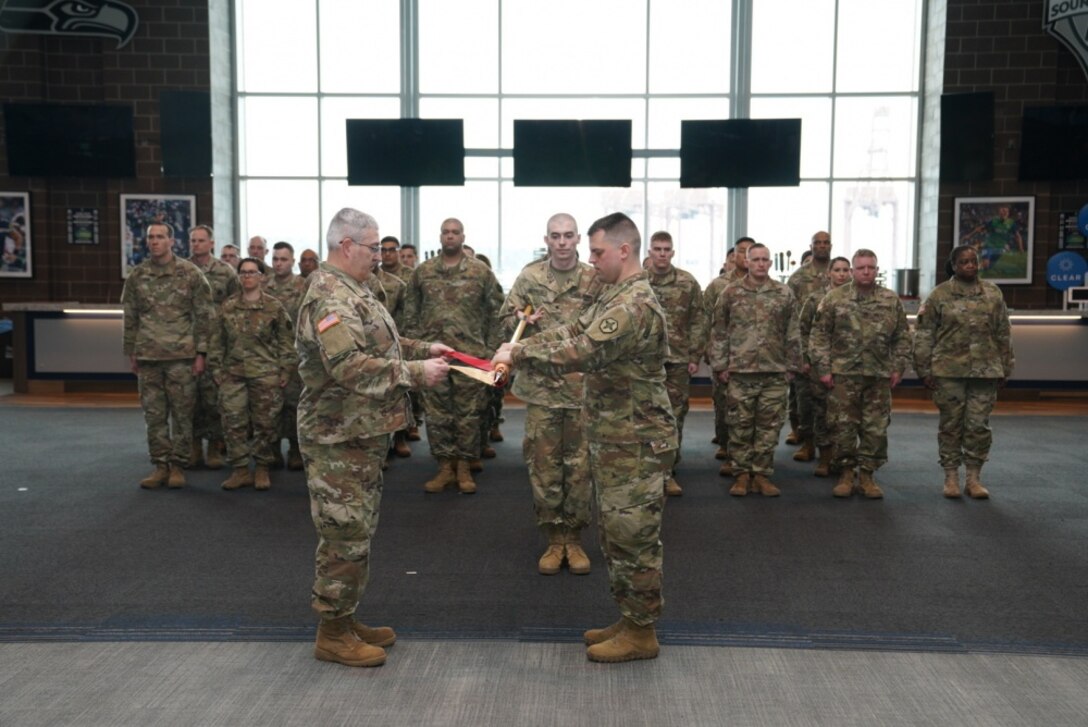 Family and friends gathered to bid farewell to approximately 50 U.S. Army Reserve Soldiers of Detachment 1, 654th Regional Support Group, 364th Sustainment Command (Expeditionary), at a send-off ceremony at CenturyLink Field Event Center, March 6, 2020. DET 1, led by Maj. Thomas Boler, a native of Vancouver, Washington, will deploy to the Middle East in support of Operation Spartan Shield, providing base life support for units rotating through the United States Central Command area of operation. The 654th RSG, headquartered in Tacoma, Washington, deploys to provide base camp sustainment and area security in support of unified land operations.