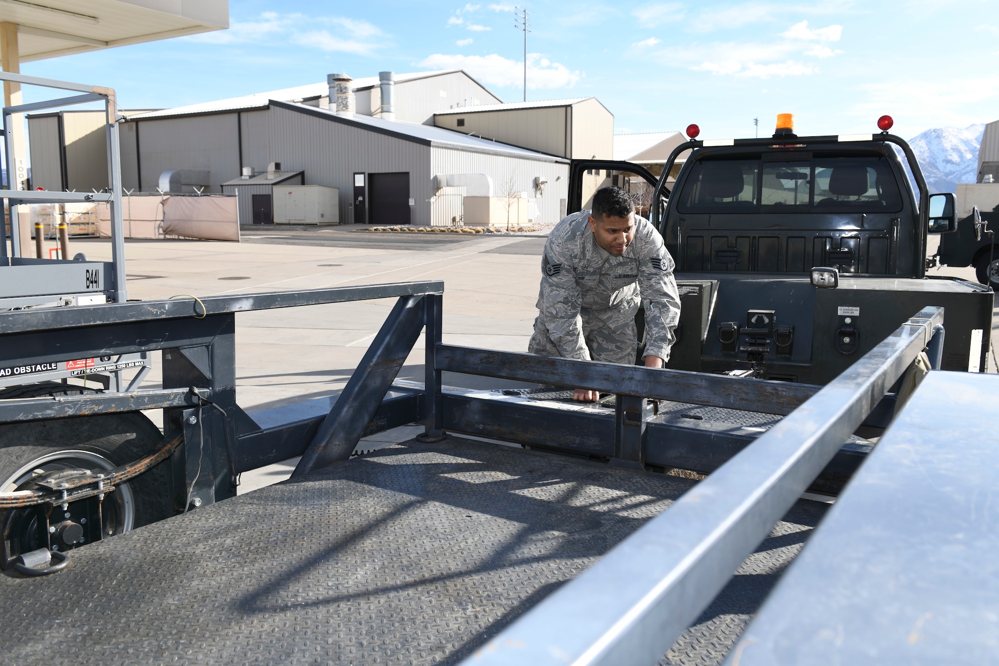 Staff Sgt. Emmanuel May, an Aerospace Ground Equipment mechanic in the 419th Maintenance Squadron, unloads a trailer March 7, 2020, at Hill Air Force Base, Utah