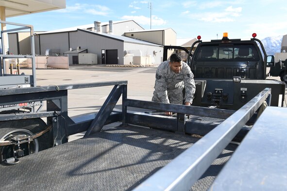 Staff Sgt. Emmanuel May, an Aerospace Ground Equipment mechanic in the 419th Maintenance Squadron, unloads a trailer March 7, 2020, at Hill Air Force Base, Utah