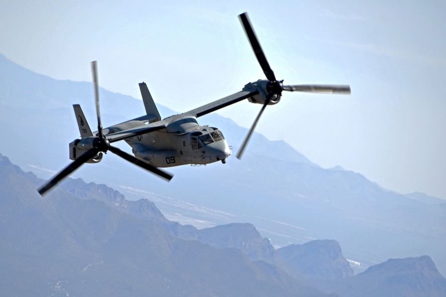 A photo of an MV-22B Osprey flying