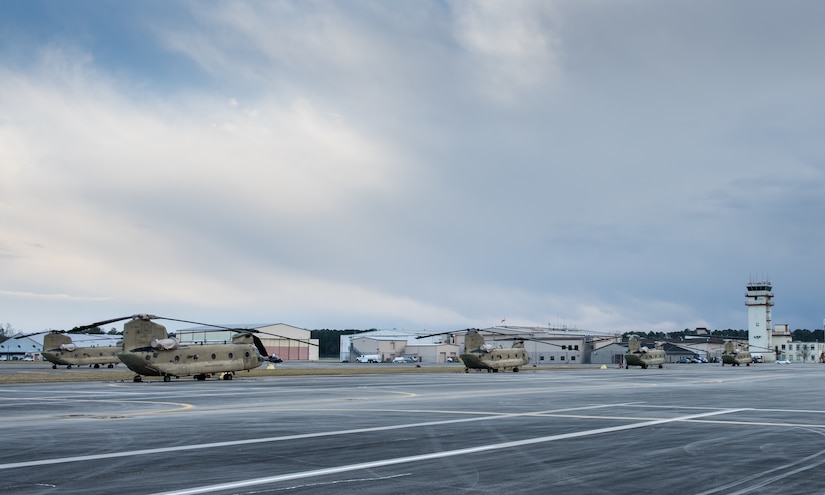 U.S. Army CH-47 Chinook helicopters sit on the Airfield at Felker Army Airfield, Joint Base Langley-Eustis, Virginia, March 6, 2020. Personnel routinely conduct training and real-world flights with these helicopters. (U.S. Air Force photo by Airman 1st Class Sarah Dowe)