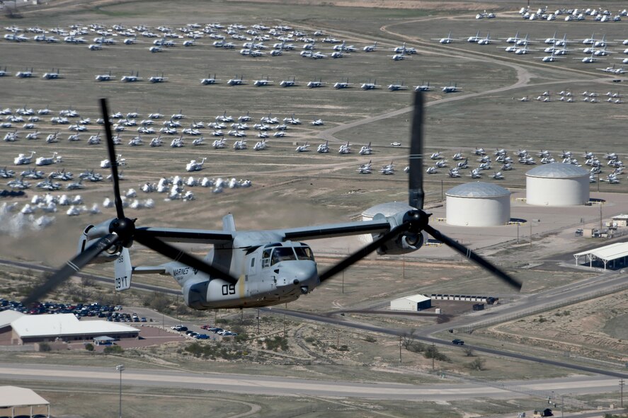 A photo of an MV-22B Osprey flying