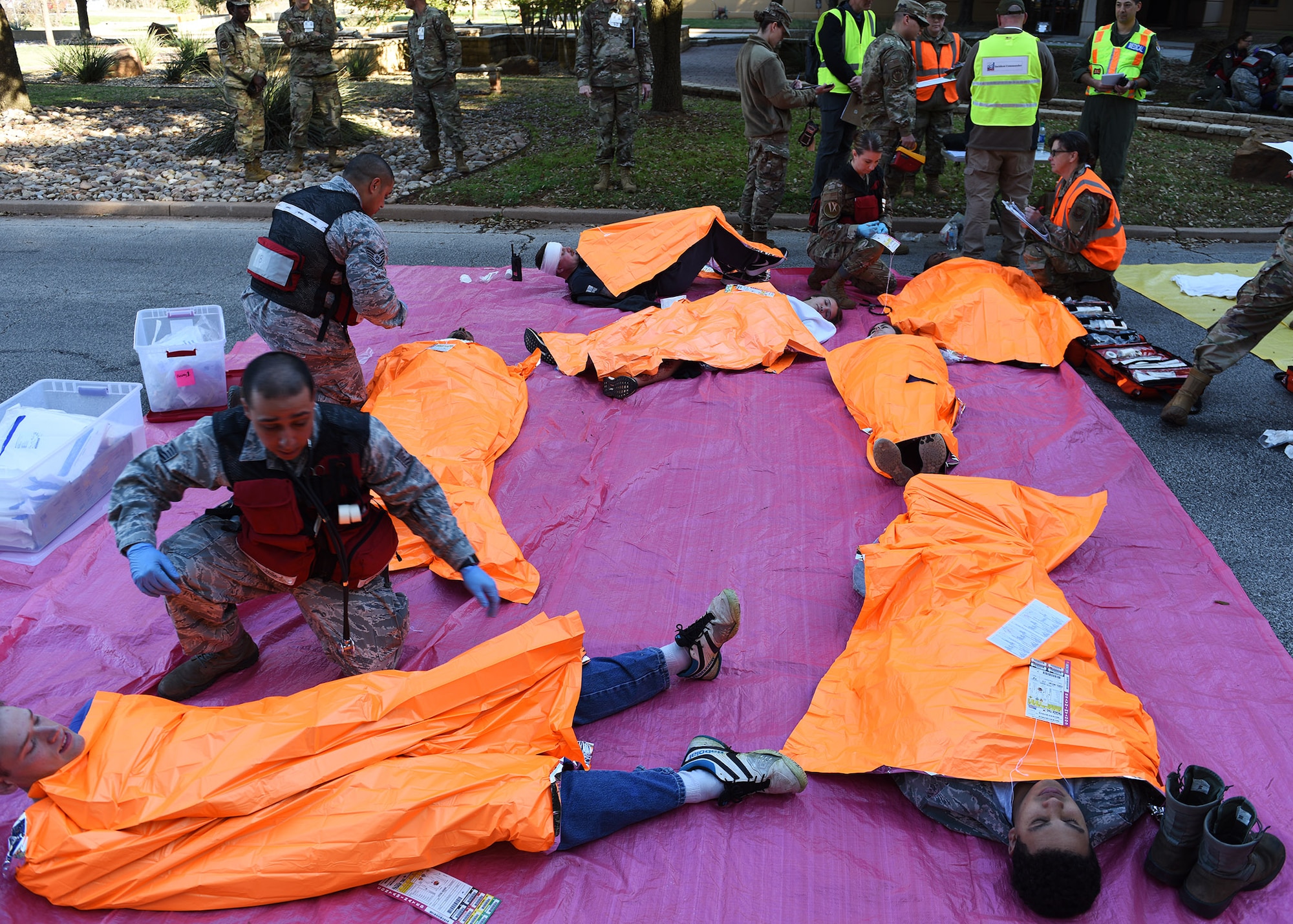 Airmen assigned to the 7th Operational Medical Readiness Squadron keep simulated patients warm during the 7th Medical Group’s chemical, biological, radiological, and nuclear exercise at Dyess Air Force Base, Texas, March 6, 2020.