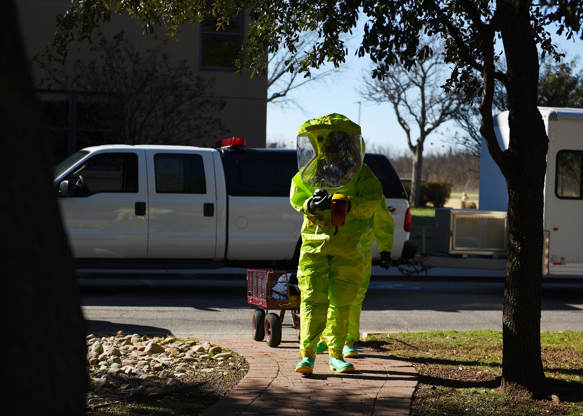 Airman Omar Thompson, 7th Operational Medical Readiness Squadron bioenvironmental engineering technician, walks towards a simulated explosion site during the 7th Medical Group’s chemical, biological, radiological, and nuclear exercise at Dyess Air Force Base, Texas, March 6, 2020.