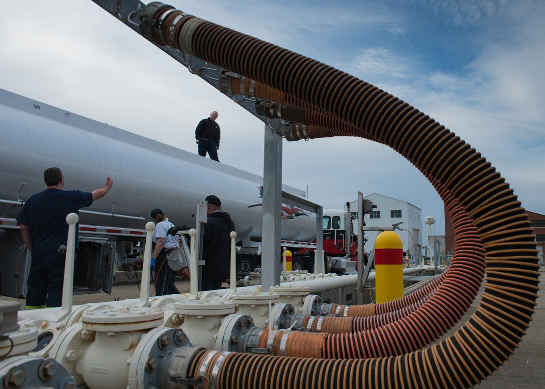 A contracted fuel truck unloads fuel into tanks at Joint Base Langley-Eustis, Virginia, March 10, 2020. Having a ready supply of fuel enables JBLE to continue the mission. (U.S. Air Force photo by Airman 1st Class Sarah Dowe)