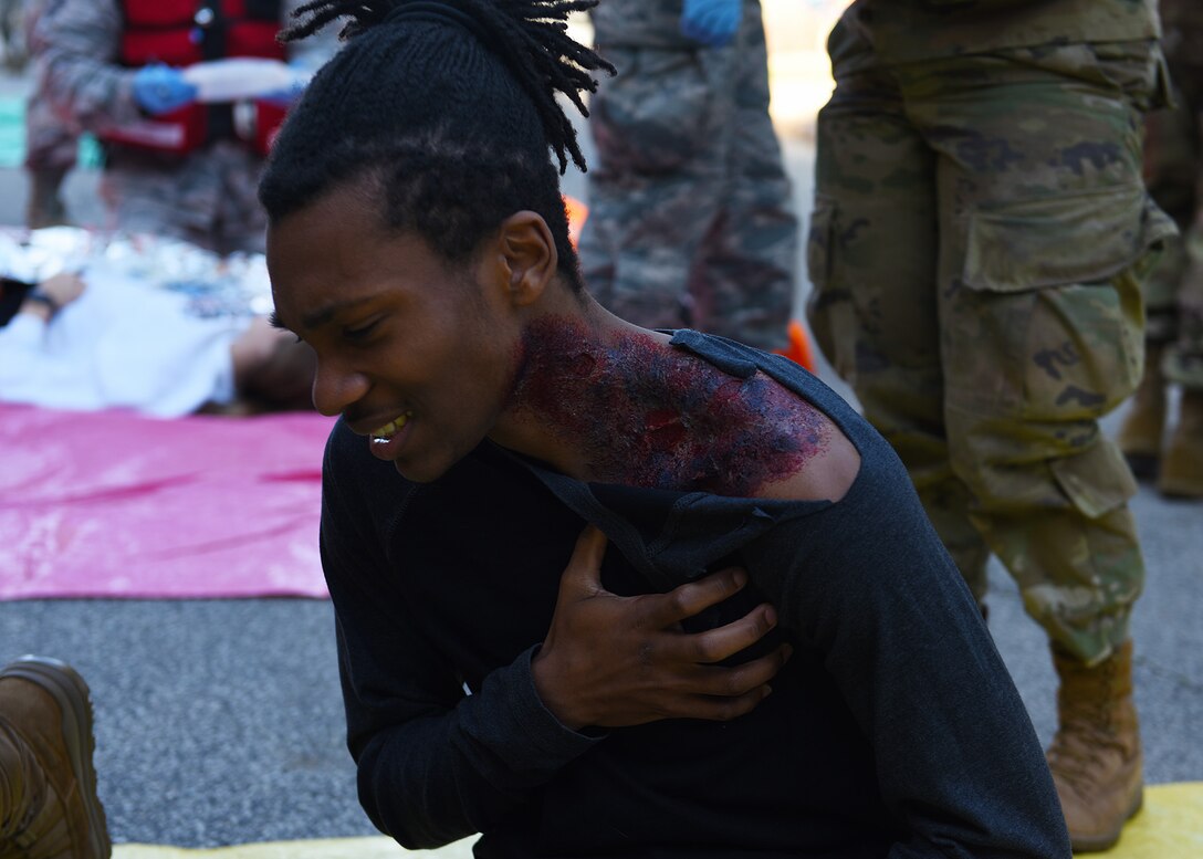 Bryan Johnson, Abilene Christian University student and simulated medical patient, waits for treatment during the 7th Medical Group’s chemical, biological, radiological, and nuclear exercise at Dyess Air Force Base, Texas, March 6, 2020.