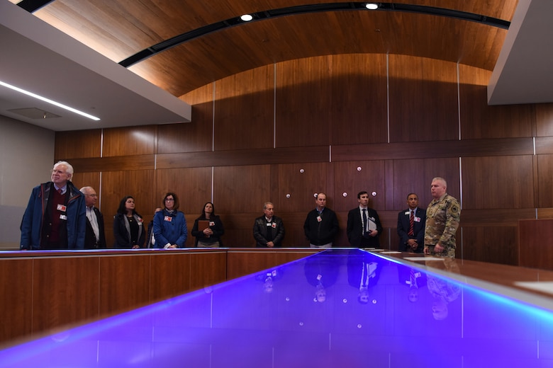 Col. Scott Brodeur, 614th Air Operations Command commander, and members of the Governor’s Military Council gather during a tour at the new Combined Force Space Component Command headquarters building, March 10, 2020, at Vandenberg Air Force Base, Calif. The GMC received various briefings and tours to preview the upcoming changes to Vandenberg AFB. (U.S. Air Force photo by Senior Airman Aubree Milks)