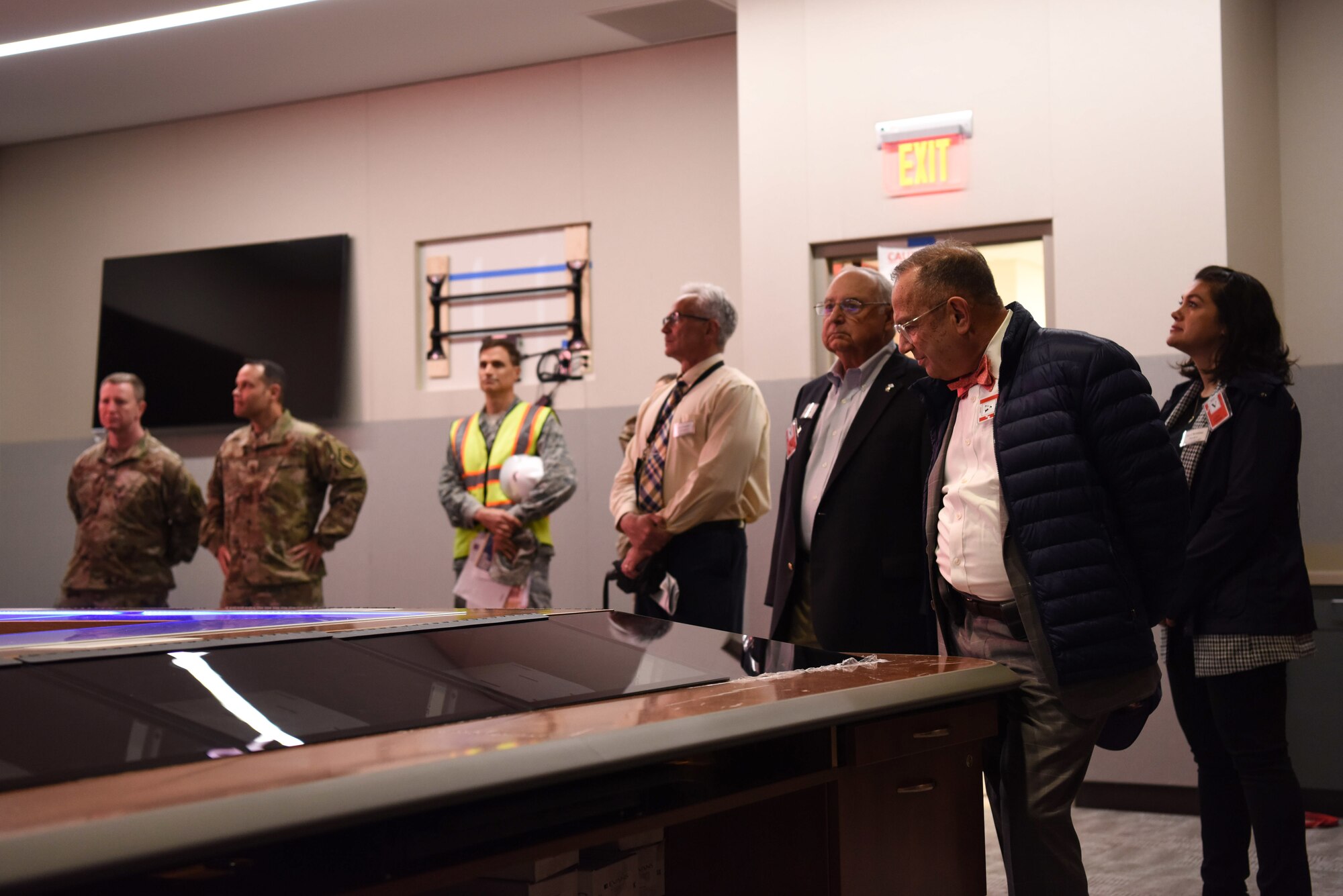 Members of the Governor’s Military Council and 30th Space Wing leadership gather during a tour at the new Combined Force Space Component Command headquarters building, March 10, 2020, at Vandenberg Air Force Base, Calif. The GMC received various briefings and tours to preview the upcoming changes to Vandenberg AFB. The GMC tour progressed the council’s understanding of the missions of the 30th SW and tenant units here, along with upcoming developments to the base to align with the United States Space Force. (U.S. Air Force photo by Senior Airman Aubree Milks)