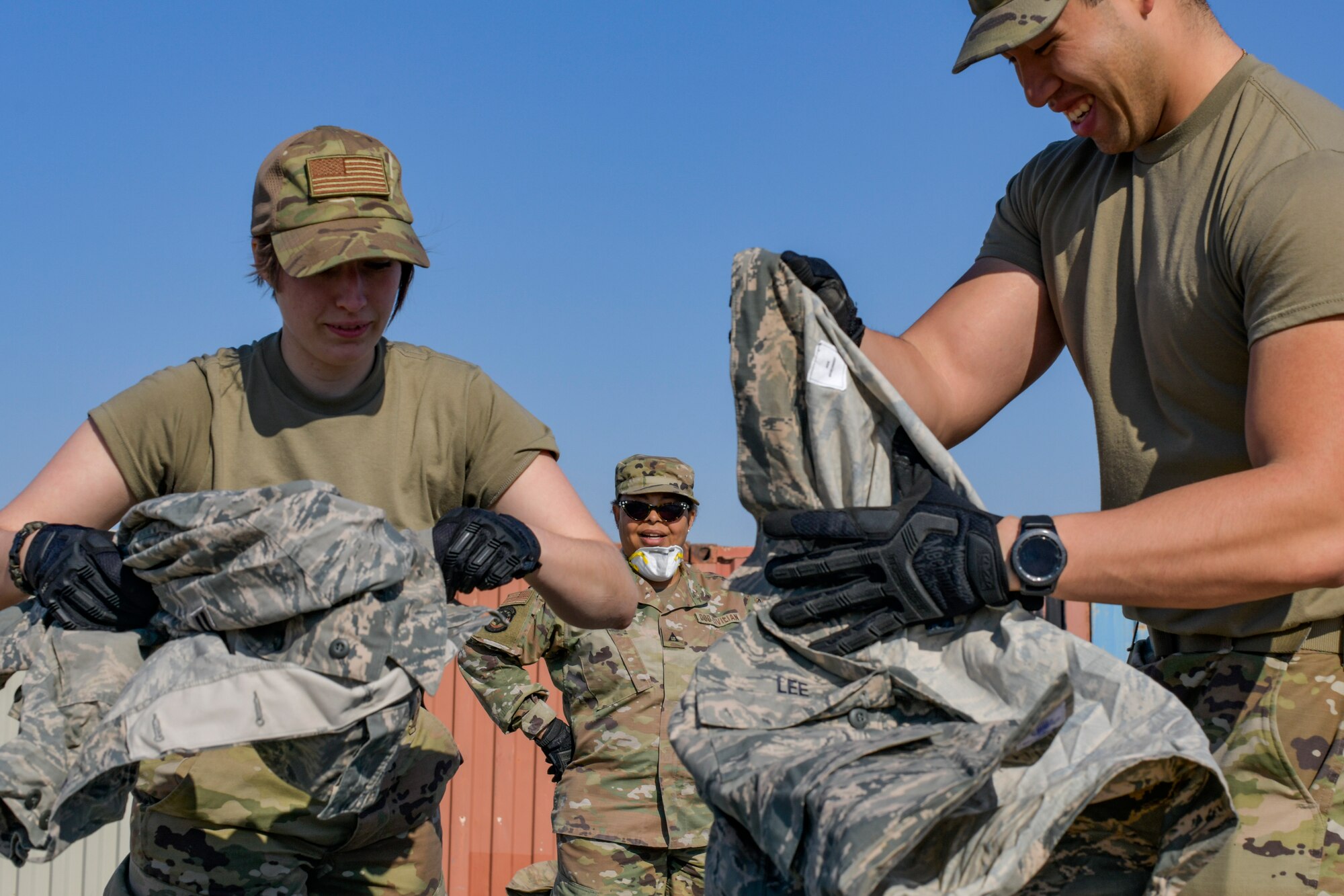 Airmen seperating uniform items