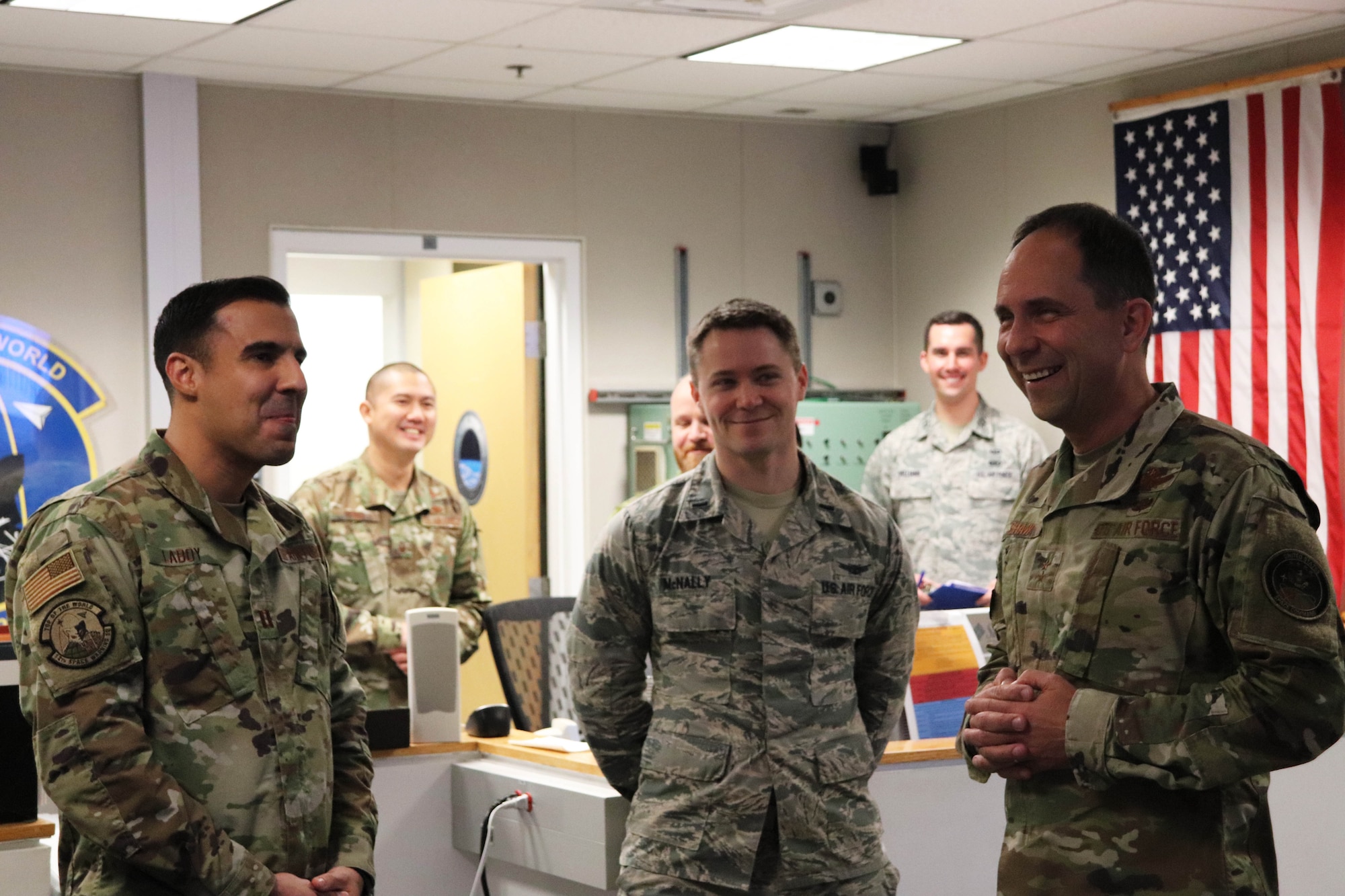 Photo of Major General Shaw talking with Airmen
