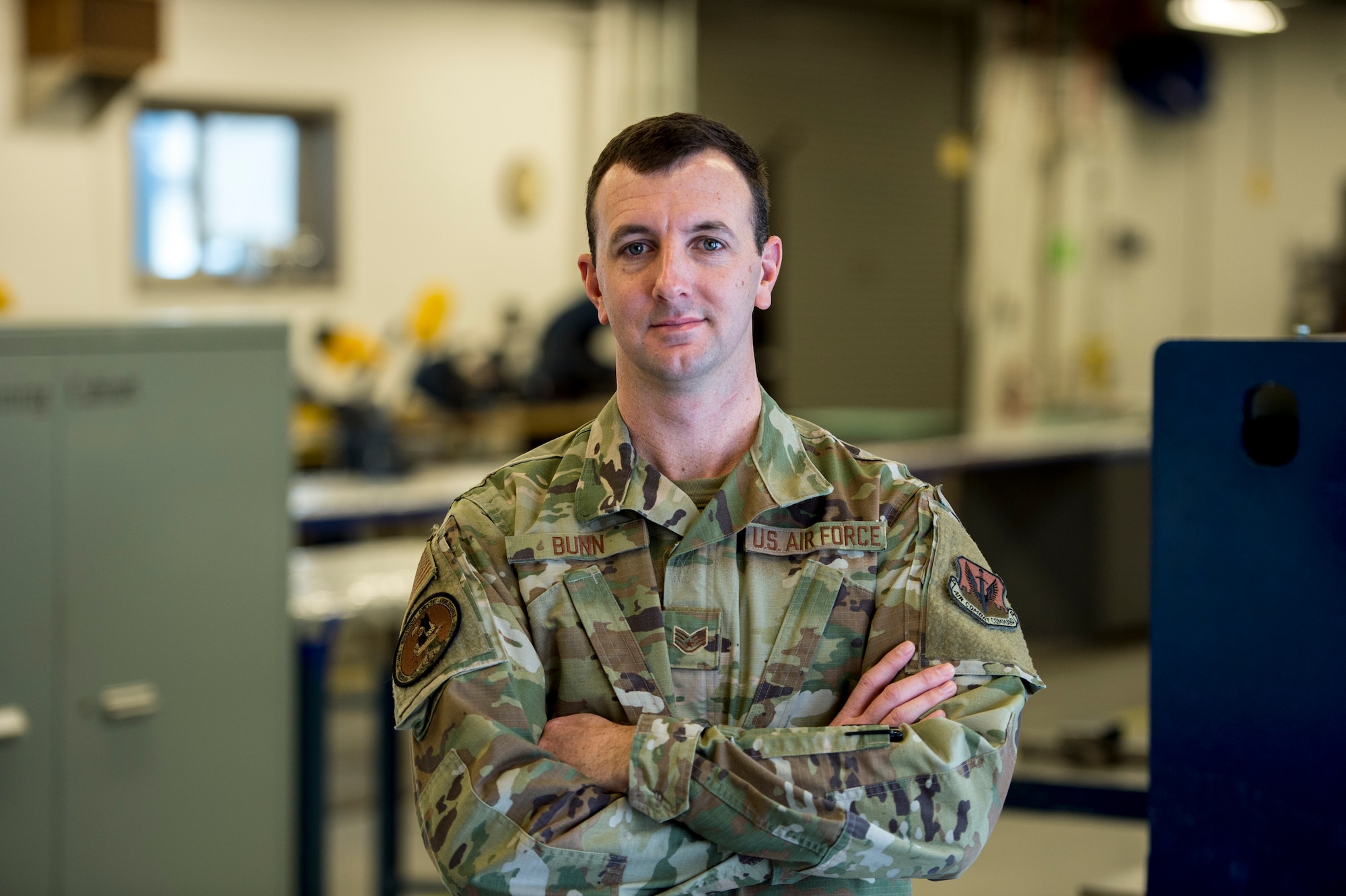 U.S. Air Force Staff Sgt. Brandon Bunn, a 388th Maintenance Group quality assurance inspector, poses for a photograph in the sheet metal shop at Hill Air Force Base, Utah, Feb. 6, 2020. Before joining the Air Force, Bunn spent most of his weekends at the drag strip racing. He continues his passion for cars more than 2,000 miles away from where it all began. (U.S. Air Force photo by Staff Sgt. Jarrod M. Vickers)