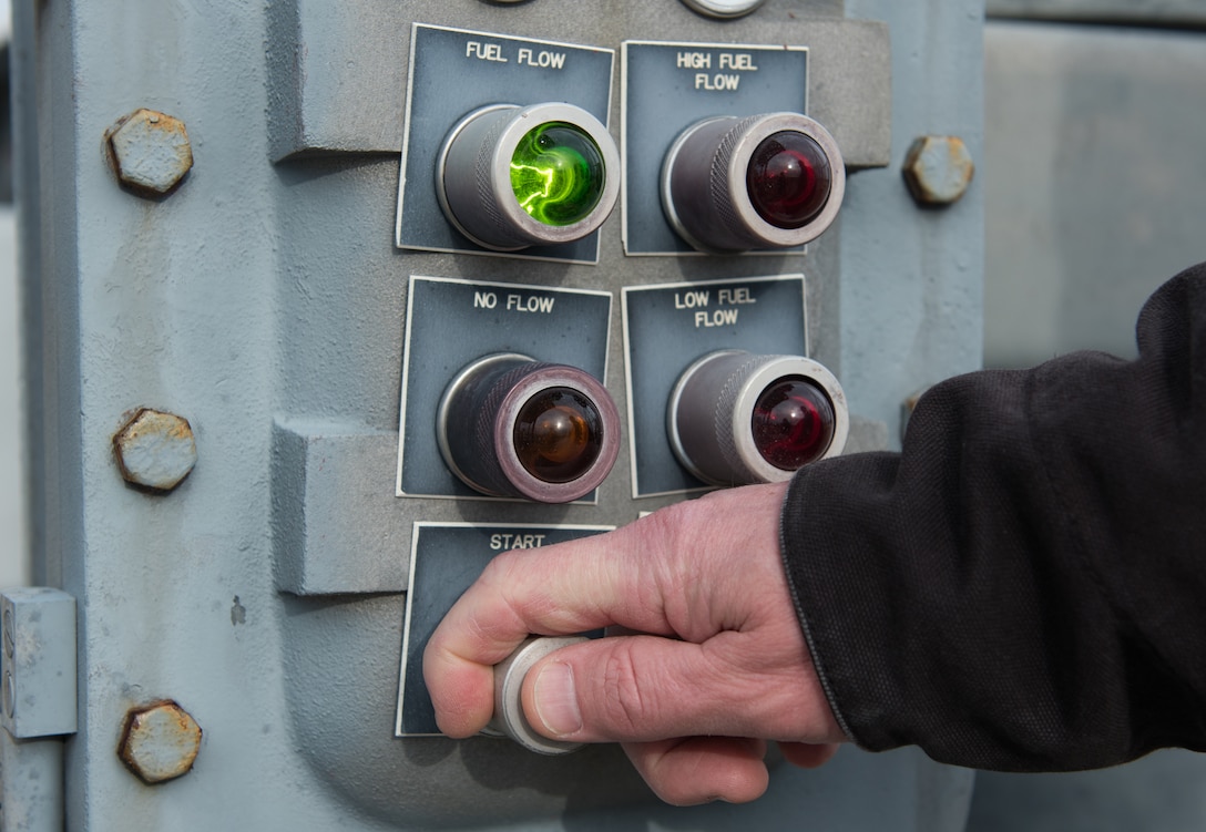 A fuel company contractor starts a fuel pump at Joint Base Langley-Eustis, Virginia, March 10, 2020. The pump is used to fill storage tanks with fuel so JBLE’s aircraft are ready to fly. (U.S. Air Force photo by Airman 1st Class Sarah Dowe)