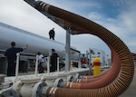 A contracted fuel truck unloads fuel into tanks at Joint Base Langley-Eustis, Virginia, March 10, 2020. Having a ready supply of fuel enables JBLE to continue the mission. (U.S. Air Force photo by Airman 1st Class Sarah Dowe)