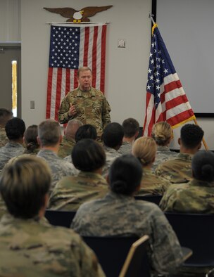 In this commentary, Lt. Gen. Richard Scobee, commander of Air Force Reserve Command (shown here talking with members of the 908th Airlift Wing, Maxwell Air Force Base, Alabama) lays out the command's plan for helping the country respond to COVID-19. (Senior Airman Shelby Thurman)